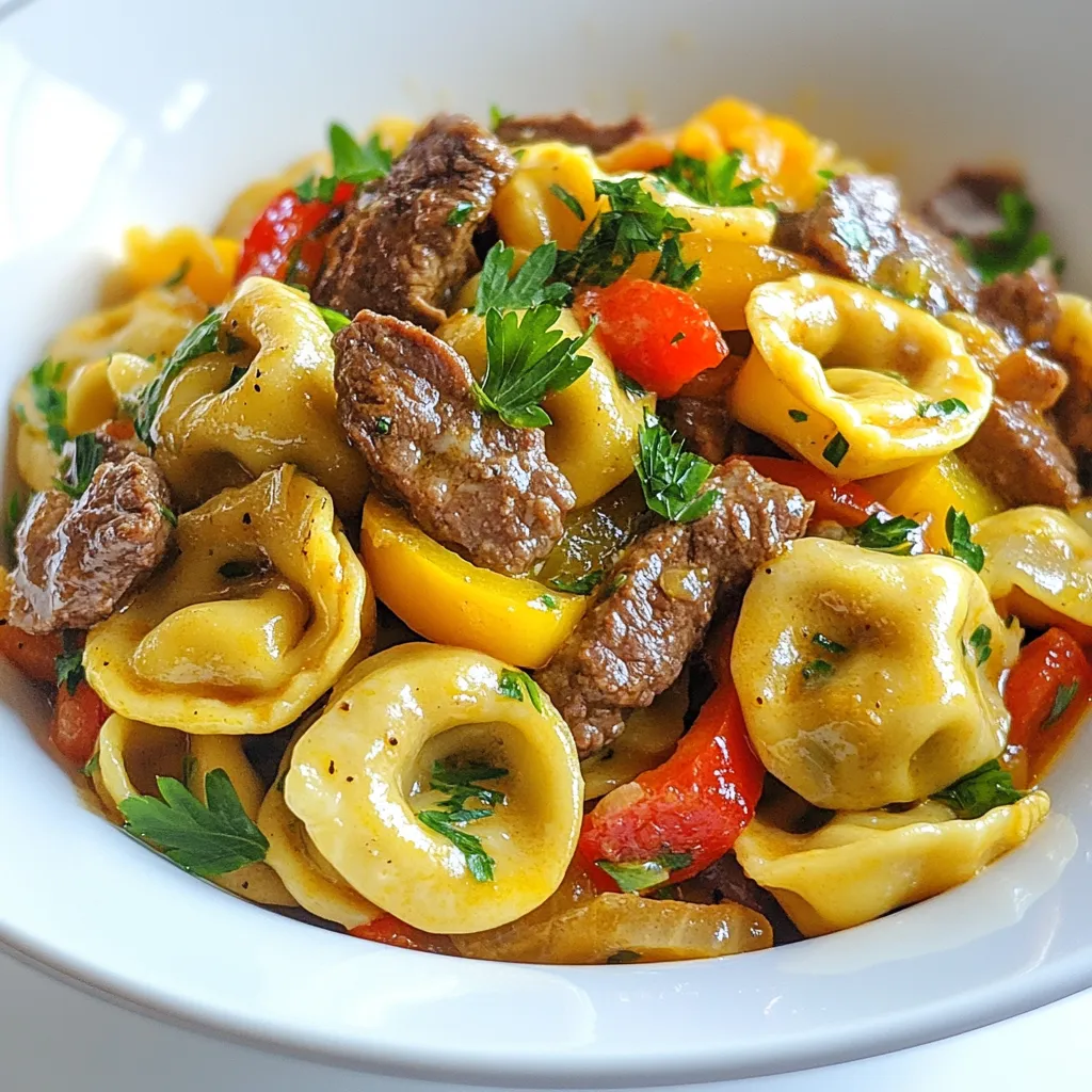 To make a tasty cheesesteak tortellini, gather these key items: - 10 oz cheese tortellini (store-bought or homemade) - 1 tablespoon olive oil - 1 small onion, thinly sliced - 1 bell pepper (red or green), thinly sliced - 1 cup thinly sliced cooked beef (or chicken) - 1 cup provolone cheese, shredded - 1 teaspoon garlic powder - Salt and pepper to taste - Fresh parsley, chopped (for garnish) These ingredients work together to create a rich and flavorful dish. While the essential ingredients shine, you can add some optional items for extra flair: - 1 tablespoon Worcestershire sauce (for a savory kick) - Other spices like paprika or Italian seasoning (for depth) These extras can personalize your dish and make it even better. Not all ingredients are set in stone. Here are some swaps you can try: - Use cooked chicken instead of beef for a lighter option. - Swap provolone cheese with mozzarella or cheddar if you prefer. - You can use frozen tortellini if fresh isn’t available. These options allow you to customize the recipe based on what you have at home. {{ingredient_image_1}} Start by boiling a big pot of salted water. Once it boils, add 10 ounces of cheese tortellini. Cook it for 3-5 minutes or until it's al dente. Drain the tortellini and set it aside. This step is key for a great texture. Next, grab a large skillet and heat one tablespoon of olive oil over medium heat. Add one thinly sliced small onion and one thinly sliced bell pepper. Sauté these for about 5-7 minutes. You want them to soften and turn a bit caramelized. This brings out their natural sweetness, making your dish even better. Now, it's time to add the fun stuff! Stir in one cup of thinly sliced cooked beef. Sprinkle one teaspoon of garlic powder over the meat. If you like, drizzle in one tablespoon of Worcestershire sauce for extra flavor. Season everything with salt and pepper. Cook this for another 2-3 minutes until it's hot. Then, add in the cooked tortellini. Gently toss it all together in the skillet. Spread the mixture out and sprinkle one cup of shredded provolone cheese on top. Cover the skillet with a lid. Let it cook for 3-4 minutes until the cheese melts and bubbles. The aroma will be amazing! Once the cheese is melted, take it off the heat. Garnish with fresh chopped parsley, and you’re ready to serve a delicious meal! To make your cheesesteak tortellini shine, focus on a few key points. First, use fresh vegetables. Fresh onions and bell peppers give a sweet taste. Sauté them until they are soft and slightly caramelized. This brings out their natural sugars. Next, season wisely. Garlic powder adds depth, while Worcestershire sauce boosts umami. Taste as you go. Adjust salt and pepper to fit your liking. Combine the meats with the veggies, so every bite has balanced flavor. One common mistake is overcooking the tortellini. Always follow package instructions. Aim for al dente, which keeps them firm. Another mistake is neglecting the cheese. Provolone should melt well on top. If you skip this step, you miss out on creamy goodness. Lastly, don’t rush the sautéing process. If you cook the veggies too fast, they won’t caramelize. This can lead to bland flavors. Take your time for the best results. For a stunning presentation, use deep bowls or wide plates. This helps show off the colorful mix. Garnish with fresh parsley for a pop of green. Drizzle a bit of olive oil or balsamic glaze over the top. This adds shine and extra flavor. You can even serve with crusty bread on the side. This makes the meal feel complete and inviting. Pro Tips Use Fresh Ingredients: For the best flavor, opt for fresh vegetables and high-quality cheese. Fresh ingredients can significantly enhance the overall taste of your dish. Customize Your Protein: Feel free to swap out beef for chicken, turkey, or even a plant-based alternative to cater to different dietary preferences and tastes. Don't Overcook the Tortellini: Be sure to cook the tortellini just until al dente. Overcooking can make them mushy and less enjoyable in the final dish. Add Extra Flavor: Consider adding a splash of hot sauce or a sprinkle of Italian seasoning for an extra kick that complements the cheesesteak flavors. {{image_2}} You can make this dish meat-free and still full of flavor. Use mushrooms, zucchini, or eggplant as the main base. Slice them thin and sauté until they are soft. Add the same onion and bell pepper for extra taste. You can also use plant-based cheese. This choice keeps the creamy texture without the dairy. If you're not in the mood for beef, chicken works great too. It adds a lighter touch but still packs a punch. You can also use turkey or even shredded pork as your protein. For a unique twist, try diced tofu or tempeh. These options soak up the flavors well and complement the dish. While provolone is classic, other cheeses can change the game. Try cheddar for a sharp kick or mozzarella for a gooey texture. Pepper jack adds spice for those who love heat. You can even mix cheeses for a more layered flavor. Each option gives a new twist to your cheesesteak tortellini. After your meal, you might have some cheesesteak tortellini left. To store it, let it cool first. Place it in an airtight container. This keeps moisture out and flavor in. Store it in the fridge. It will last for about 3 to 4 days. When you're ready to enjoy leftovers, reheating is key. Use a skillet over medium heat. Add a splash of water or broth to keep it moist. Stir gently until it's heated through. You can also microwave it. Cover the dish with a lid or wrap to trap steam. Heat for one minute, then check. Repeat if needed until warm. If you want to save your tortellini for later, freezing works great. First, let the dish cool completely. Then, divide it into portions. Use freezer-safe bags or containers. Squeeze out as much air as possible. Label with the date and freeze. It will stay good for up to 3 months. To reheat, thaw in the fridge overnight. Then, follow the reheating instructions to enjoy a quick meal! Yes, you can use fresh tortellini. Fresh tortellini cooks faster than dried. Follow the package instructions for the best results. Typically, fresh tortellini takes about 2-3 minutes to cook. Just keep an eye on it to avoid overcooking. Fresh tortellini can add a nice texture and flavor. To make cheesesteak tortellini gluten-free, choose gluten-free tortellini. Many stores offer this option now. Besides the tortellini, ensure your beef and other ingredients are gluten-free. Always check labels to avoid hidden gluten. You can also use zucchini noodles as a fun alternative. You can prepare the cheesesteak tortellini in advance. Cook the tortellini and sauté the vegetables as usual. Store them separately in the fridge. You can combine them right before serving. This makes it easy to enjoy a quick meal. Just remember to add the cheese when you're ready to heat it up! This blog post has covered everything about cheesesteak tortellini. We discussed essential ingredients and helpful tips for making this dish tasty. I shared ways to avoid common mistakes and how to serve it well. Remember, you can customize the recipe with different proteins and cheeses. In the end, cheesesteak tortellini is fun to make and eat. Enjoy trying out these ideas in your kitchen!